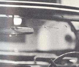 Figure 30. Lead on inner surface and cracks on outer surface of windshield