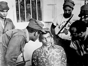 Interrogation of a captured Bay of Pigs invader by Cuban militia