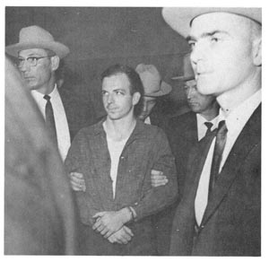 Oswald in custody of Dallas Police
