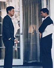 John and Robert Kennedy in discussion outside the White House, 28 Mar 1963