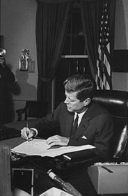 President Kennedy signing the declaration of quarantine during the Cuban Missile Crisis, 23 Oct 1962.