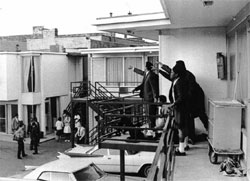 Aides on Lorraine Motel balcony with the stricken Dr. King.